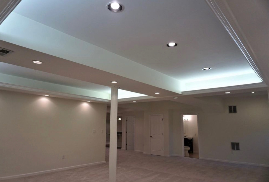 Beautiful finished basement with modern design and functional living space in Maryland home