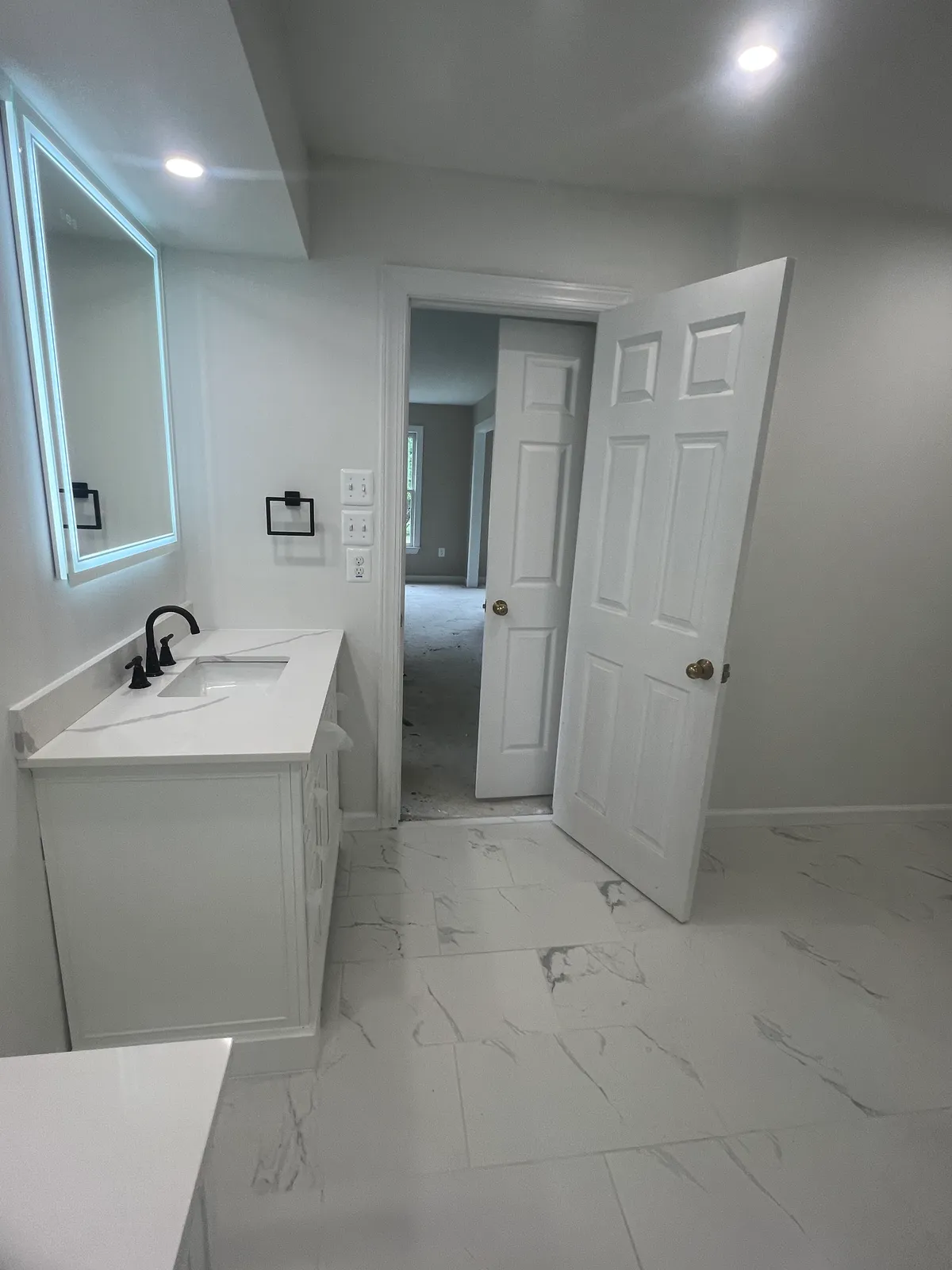 Tiled shower niche and built-in shelving